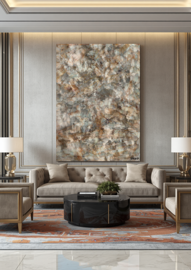 Salon moderne avec canapés, table basse décorative et tableau mural aux tons neutres.