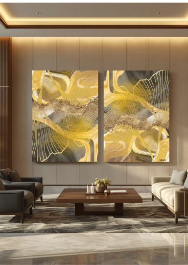 Deux tableaux abstraits aux nuances de jaune et gris, décorant un salon moderne.